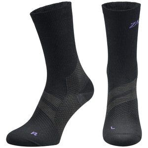 A pair of black Merino Wool Edition by ZaTech® socks on white background. Front left and center angle..